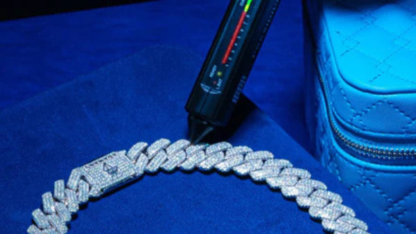 Adamans iced-out chain being diamond tested