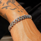 10mm Cuban Iced Clasp Bracelet in White Gold on wrist.