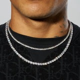 3mm and 5mm White Gold Tennis Chain Bundle on Neck.