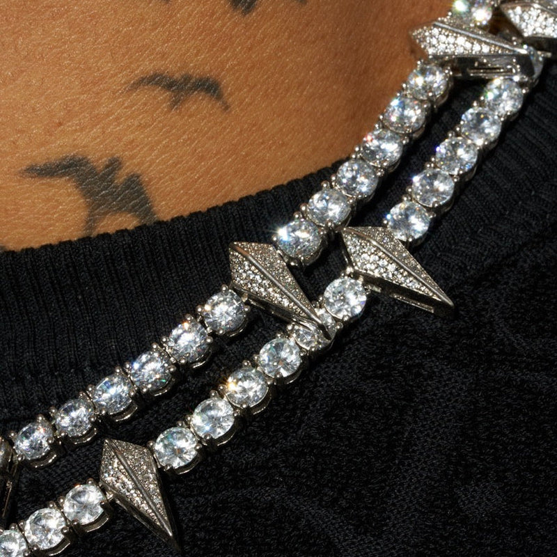 5mm PAVE SPIKE TENNIS CHAIN in white gold with round cut stones and spike accents.