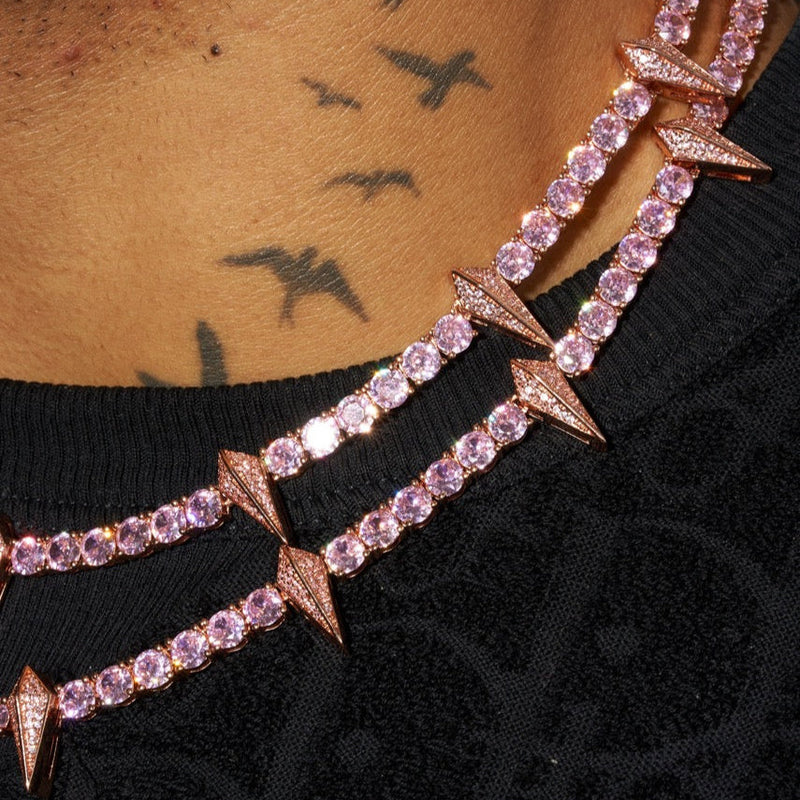 5mm pink pave spike tennis chain necklace with round cut stones and gold vermeil plating.