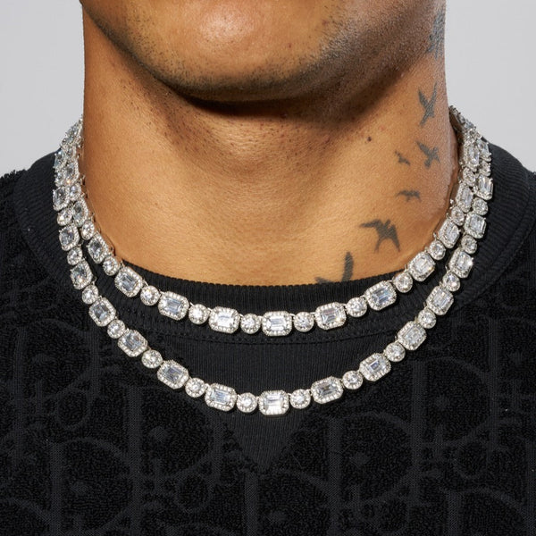 9mm clustered tennis chain in white gold with baguette-cut stones.