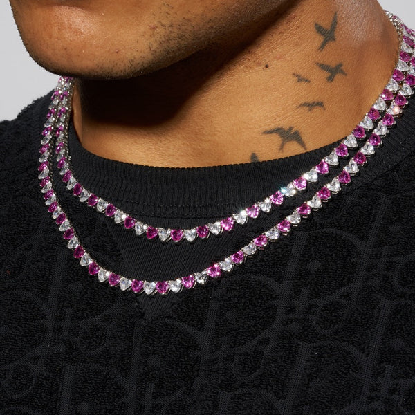 5mm white and pink heart tennis chain in white gold, worn around neck, showcasing sparkling stones and premium 18K plated design.