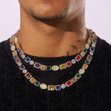 10MM Moissanite Multi Gemstone Chain in 925 Silver with colorful gemstones worn around the neck.