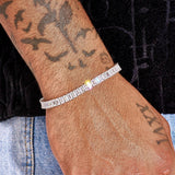 3MM Moissanite baguette tennis bracelet in 925 silver on wrist with tattoos