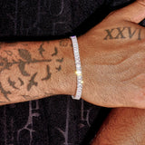 3MM Moissanite baguette tennis bracelet in 925 silver on wrist with tattoos