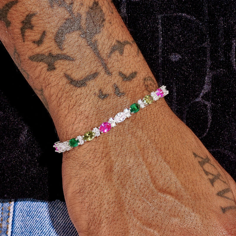 5MM Moissanite multicolor mixed oval cut tennis bracelet in 925 silver on wrist