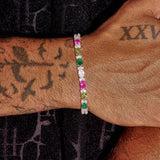 5MM moissanite multicolor oval cut tennis bracelet on wrist in 925 silver