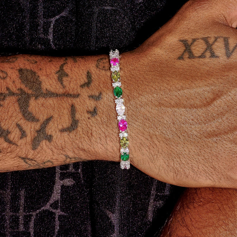 5MM moissanite multicolor oval cut tennis bracelet on wrist in 925 silver