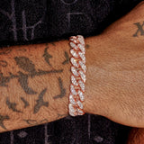 10mm iced Cuban bracelet in rose gold with diamond simulants on wrist