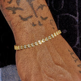 Broken Heart Bracelet gold plated with diamond simulant hearts on wrist
