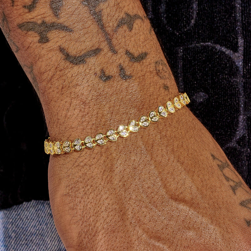 Broken Heart Bracelet gold plated with diamond simulant hearts on wrist