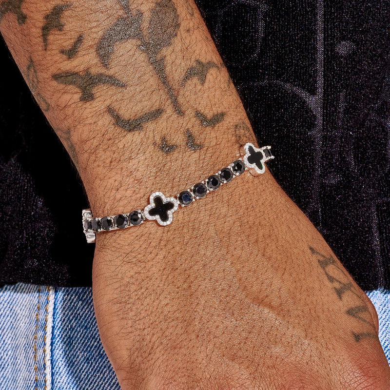 5MM black four leaf clover tennis bracelet in white gold on wrist