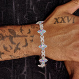 Multicolor Cuban Bracelet in white gold with vibrant multicolor links worn on wrist.