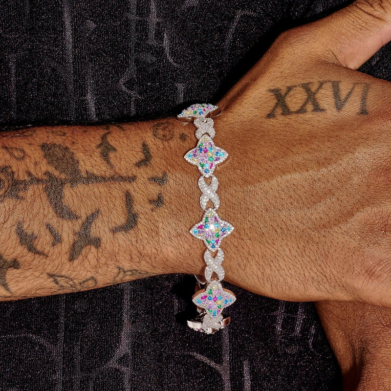 Multicolor Cuban Bracelet in white gold with vibrant multicolor links worn on wrist.
