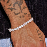 8MM opal and pear tennis bracelet in white gold on tattooed wrist