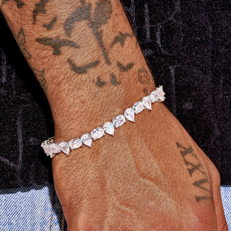 8MM opal and pear tennis bracelet in white gold on tattooed wrist