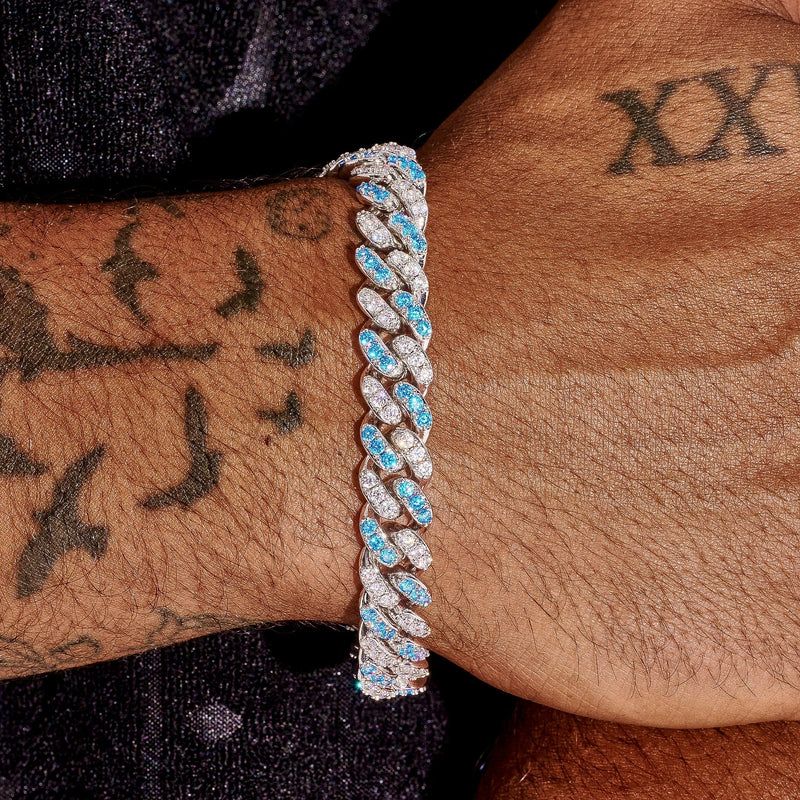 10mm iced Cuban bracelet with white and blue stones on wrist