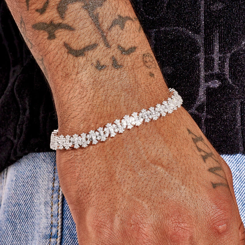 8.5MM Iced Out Cross Link Bracelet in white gold with sparkling cross-shaped links on wrist