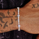 Gem Stationed Tennis Bracelet in white gold with evenly placed sparkling gems on wrist