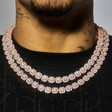 Close-up of a man wearing a double-layered 10mm Moissanite clustered tennis chain in rose gold 925 silver with sparkling VVS1 stones