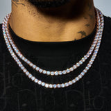 6mm Moissanite tennis chain in rose gold with VVS1 clarity stones worn on neck