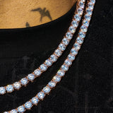 6mm moissanite tennis chain in rose gold with 925 silver and VVS1 D color stones sparkling on black fabric