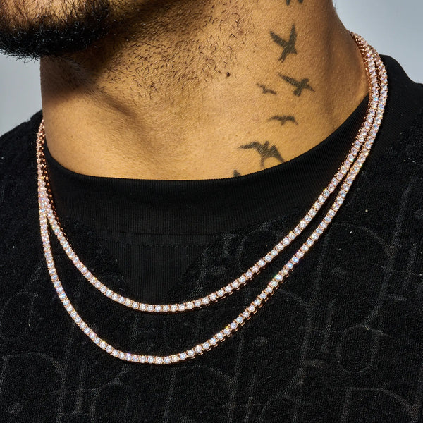 Close-up of a person wearing double-layered 3mm Moissanite tennis chains in rose gold with sparkling VVS1 clarity stones on a black shirt