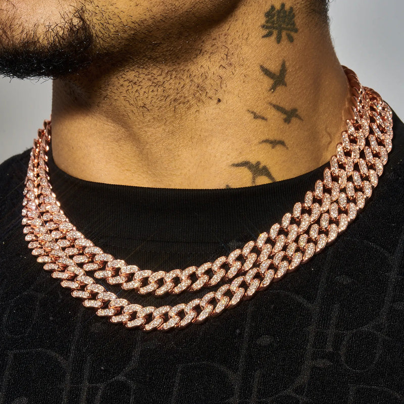13mm rose gold moissanite Cuban chain on male neck with black shirt and neck tattoos