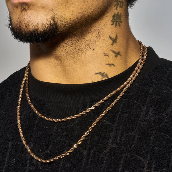 4mm rose gold rope chain necklace on a man's neck with tattoos and black shirt