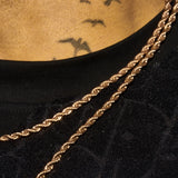 4mm rose gold rope chain necklace on neck with black shirt