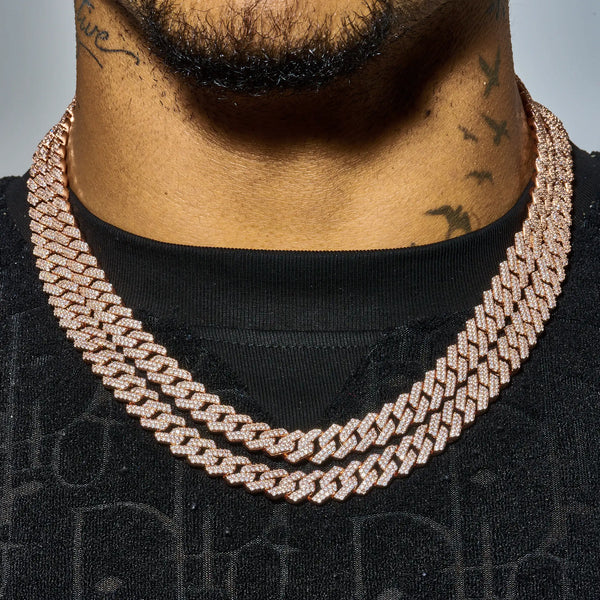 Close-up of a man wearing a 10mm Moissanite Monaco Chain in rose gold with sparkling VVS1 D Colour stones on black shirt
