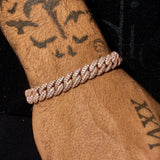 8mm Moissanite iced Cuban link bracelet in rose gold on wrist