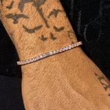 3mm Moissanite tennis bracelet in rose gold plated 925 silver on wrist with sparkling round stones