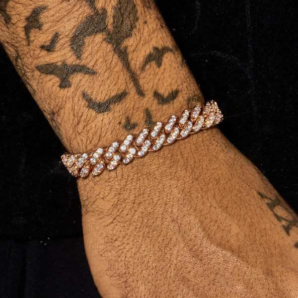 13mm rose gold moissanite iced Cuban link bracelet on tattooed wrist