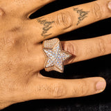 Moissanite Iced Star Ring in rose gold with VVS1 clarity on hand finger