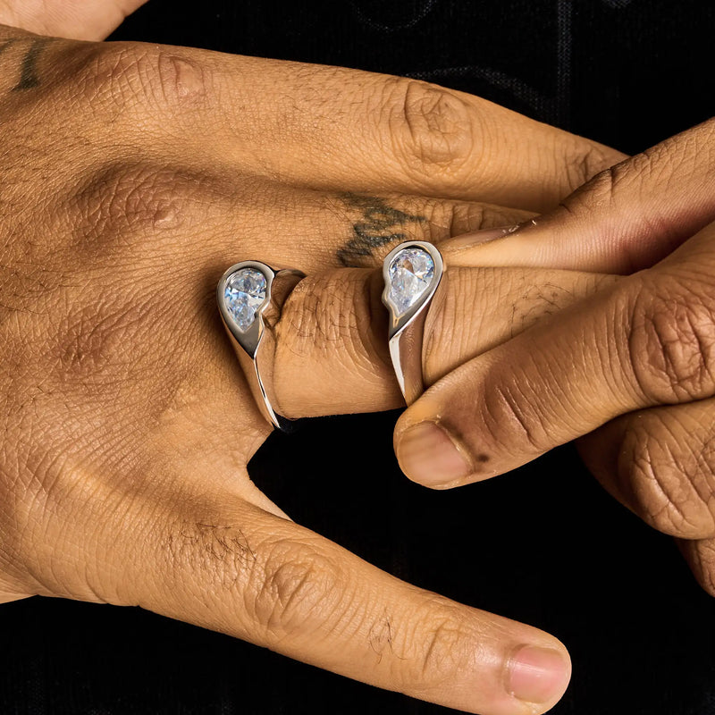 Broken Heart Ring in white gold with diamond simulant worn on fingers
