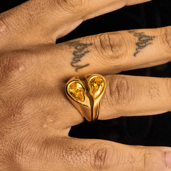 Gold Broken Heart Ring with diamond simulants on finger, elegant 18K plated jewelry piece