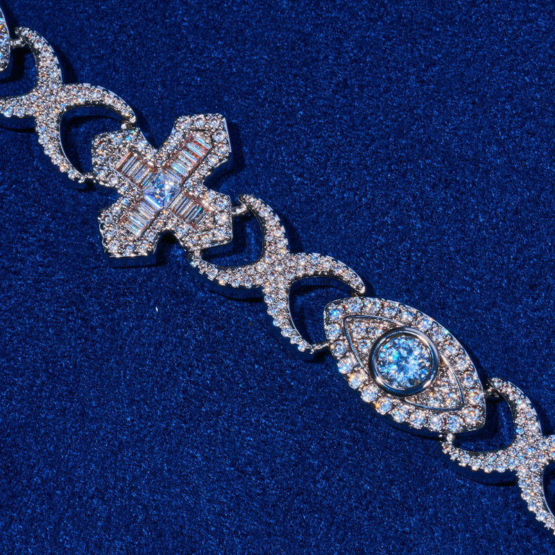 Close-up of Moissanite Baguette Cross Evil Eye Chain in 925 silver with baguette-cut stones and evil eye motif on blue background