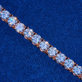 5mm rose gold tennis chain with round cut stones on blue background