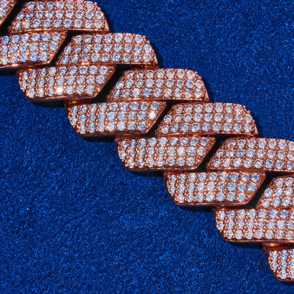 20mm Monaco Chain rose gold with hand-set sparkling stones on blue background