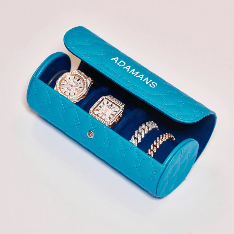 Blue leather travel watch roll by Adamans with luxury quilted design holding watches and bracelets