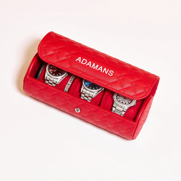 Red leather travel watch roll by Adamans with adjustable strap and three compartments for watches