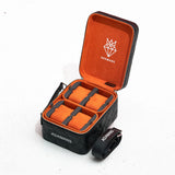 Black leather travel jewellery case with orange suede interior and adjustable shoulder strap