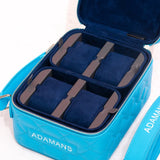 Small blue leather travel jewellery case with stackable suede trays and adjustable shoulder strap by Adamans