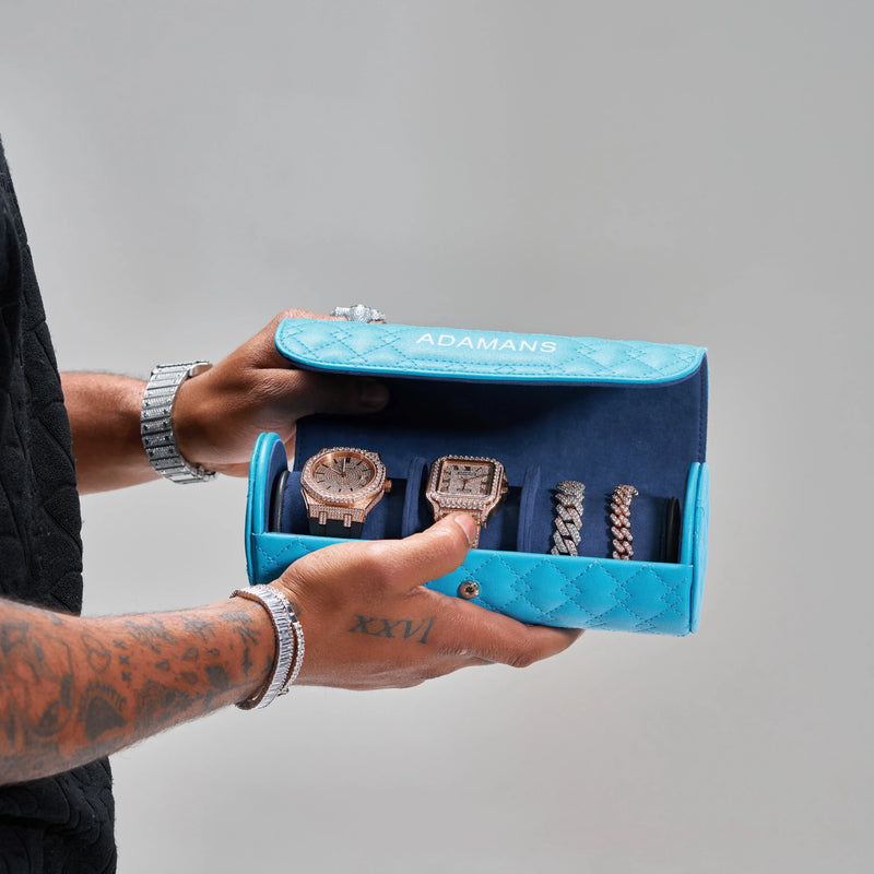 Blue leather travel watch roll holding luxury watches and bracelets with Adamans branding