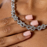 8mm iced infinity chain white gold necklace with diamond simulants on hand