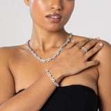 woman wearing 8mm iced infinity chain white gold necklace bracelet and ring set
