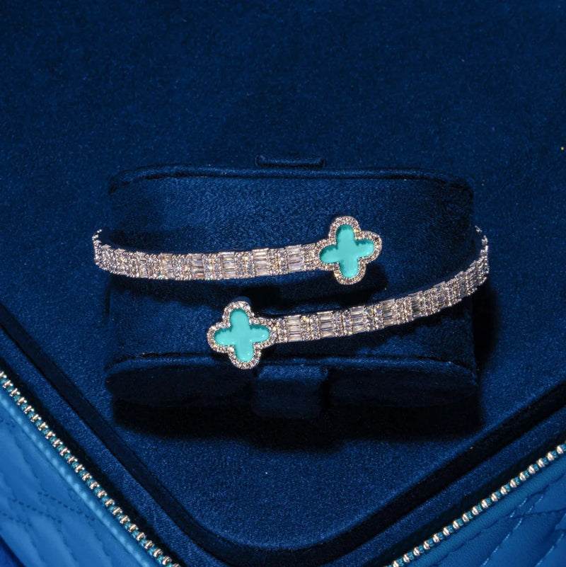 8MM Moissanite Green Motif Baguette Bangle in 925 Silver with white gold plating and green motif stones in a blue velvet box