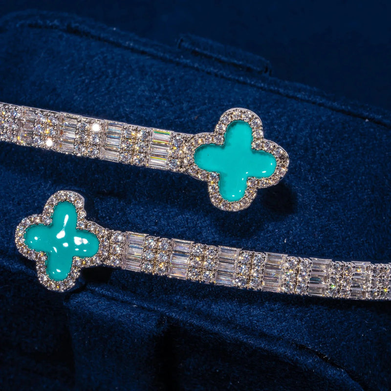 8MM Moissanite Green Motif Baguette Bangle in 925 silver with white gold plating and VVS1 D colour stones on blue velvet background